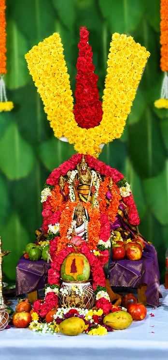 Deity adorned with flower